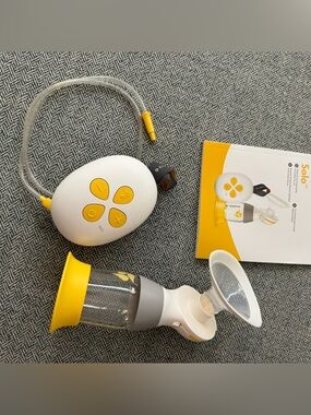 Medela Solo and hand pump lot